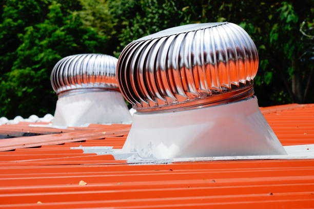 istock Air ventilators on the roof top spinning 1174634109