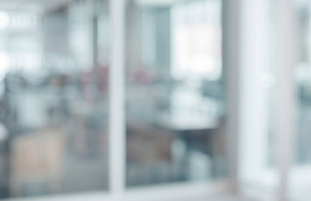 istock Blurred white abstract glass wall from modern building 1174638968