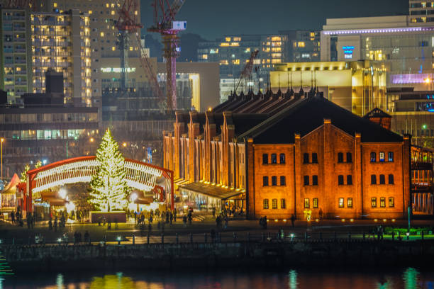 Red brick warehouse and the Christmas tree Red brick warehouse and the Christmas tree. Shooting Location: Japan: Yokohama リボン stock pictures, royalty-free photos & images