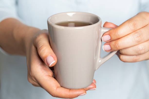 istock Woman with Mug of Tea 1174642682