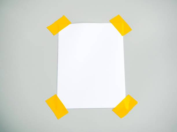 paper white and sticky tapes on gray background