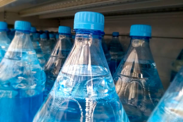 istock Clear fresh water in plastic bottle place on store market self merchandise 1174645142