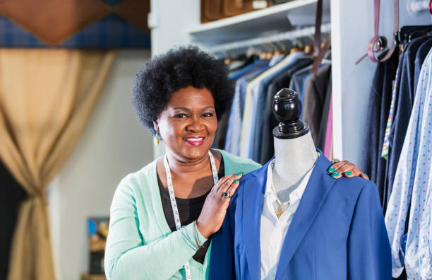 Woman working in men's clothing store