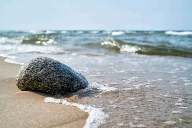 Stone on the beach of the Baltic coast at Rewal in Poland
