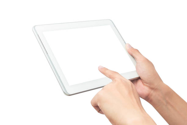 istock Male hand holding the white tablet pc computer and touching with blank screen isolated on white background with clipping path 1174652560