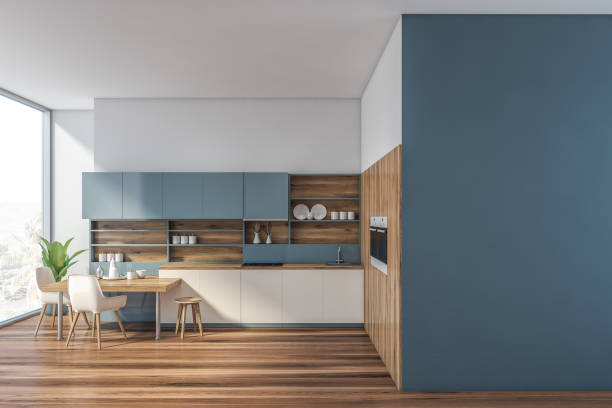 istock Blue and wooden kitchen with mock up wall 1174655033