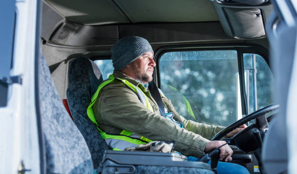 istock Hispanic man driving a truck 1174655255
