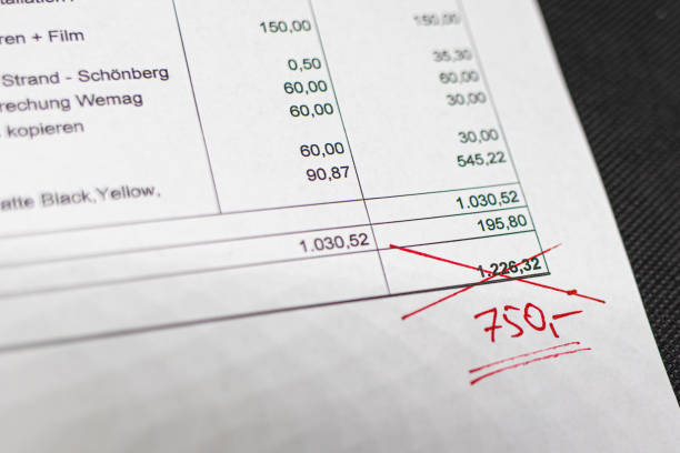 istock a printed invoice was simply shortened with a red pencil 1174656237