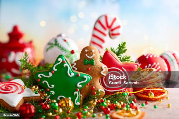 Festive Concept With Christmas Gingerbread In The Shape Of A Star Fir Branches And Winter Spices Stock Photo - Download Image Now
