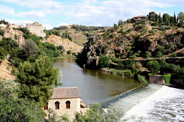 istock Small dam on Tagus River at Toledo, Spain 1174663291
