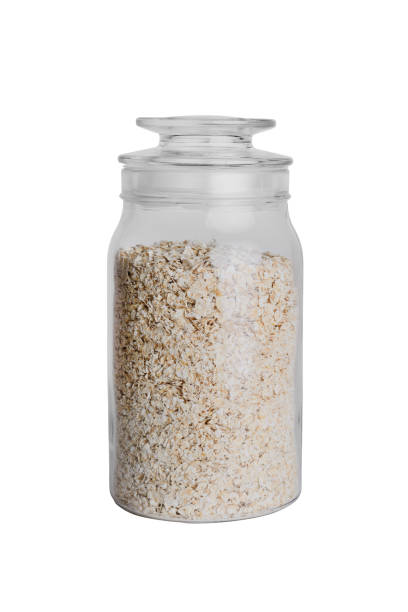 istock glass jar filled with oatmeal isolated on white background 1174665024