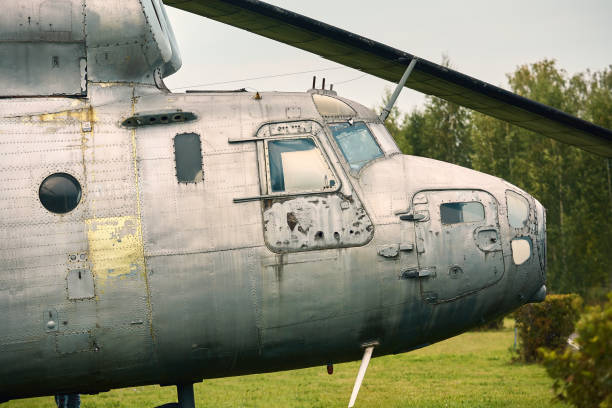 istock A close-up combat helicopter of gray color. Color tinting. 1174675708