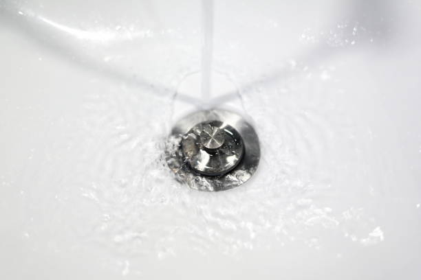 istock Washbasin tap with stainless steel waste 1174677333