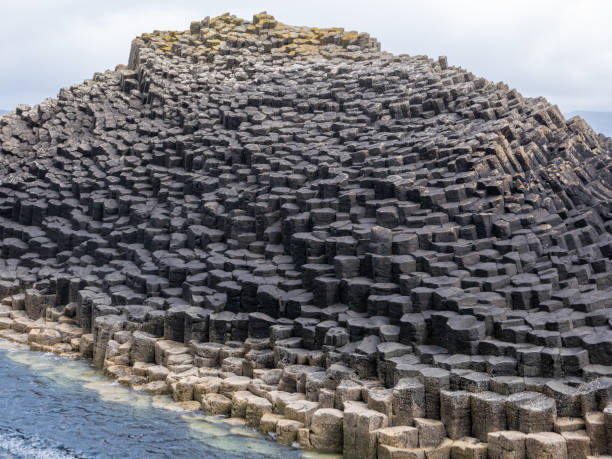 istock Basalt rock columns by Fingal's Cave, on the Isle of Staffa 1174677417