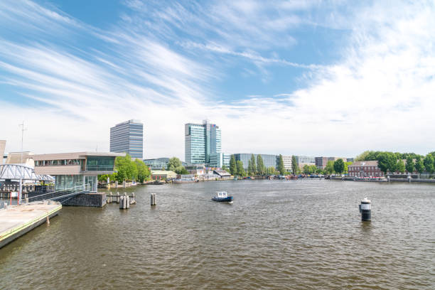Amsterdam, Netherlands - June 7, 2019: Oosterdok water at Amsterdam.