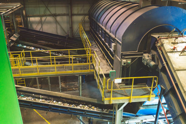 istock Conveyor belts full of waste inside the recycling center 1174679901