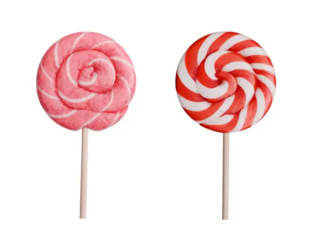 Photo of two Christmas candies in different colors, on a white background