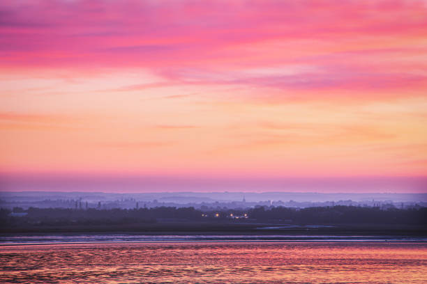 View across Sandwich Bay from Ramsgate Esplanade at dusk during a beautiful September sunset. View across Sandwich Bay from Ramsgate Esplanade at dusk during a beautiful September sunset. sandwich kent stock pictures, royalty-free photos & images