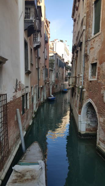 istock Narrow canal in Venice 1174692759