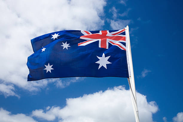 istock Australia flag against blue sky 117470929