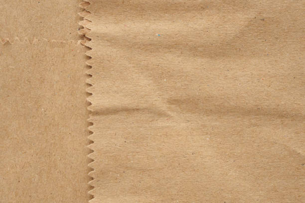 istock Old brown vintage paper texture background 1174713039