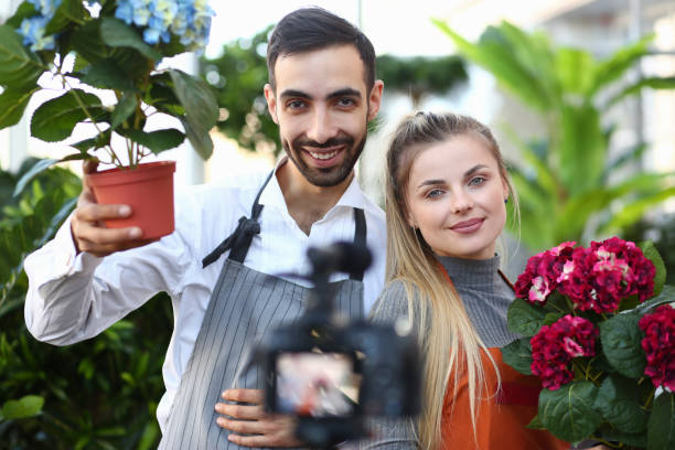 istock Vlogger Gardener Showing Camera Hortensia Flower 1174713095