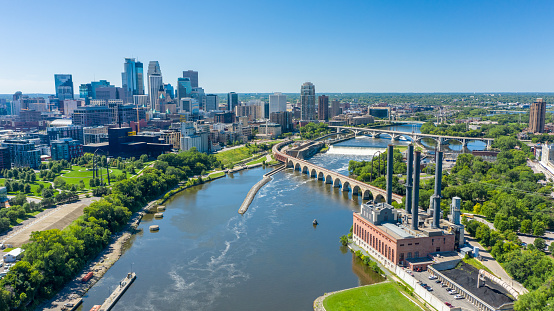 Aerial view of downtown Minneapolis over the Mississippi River.