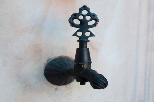 Old street washbasin with a tap. With beautiful marble texture