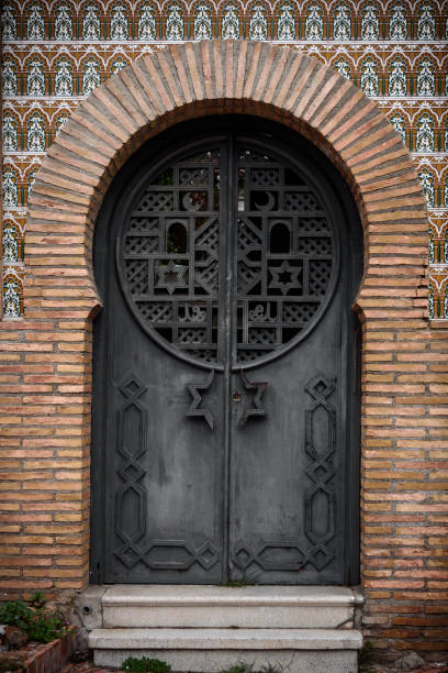 architecture detail of an arab door in grenade, spain.