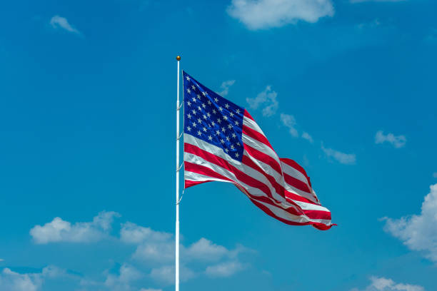 istock United States flag on pole 1174720351