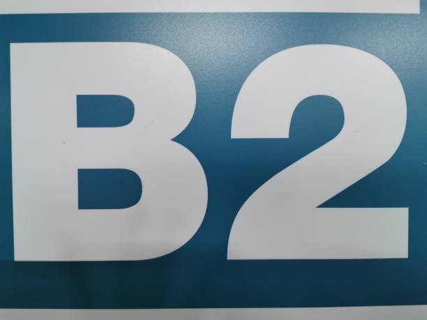 istock The white sign later B 2 on blue background 1174723166