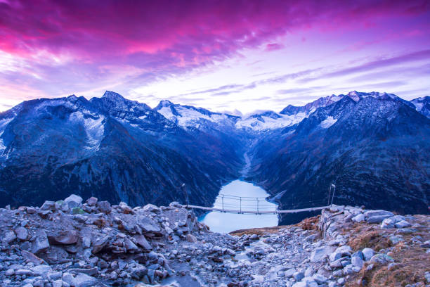 The Schlegeis Basin is in the province Tyrol in Austria, that surrounded by the high mountain nature park Zillertaler Alps. There is a reservoir called Schlegeisspeicher situated underneath the Zillertal Alps.
