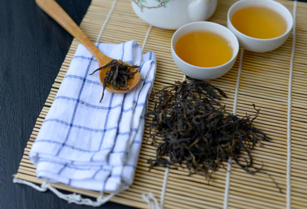 istock Set of Chinese tea in a white teacup on the tea table 1174734338