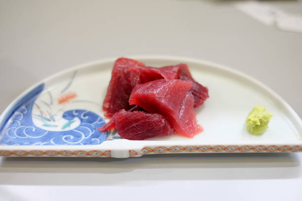 istock Fresh japanese Akami Sushi (Makuro) on white dish. 1174743063