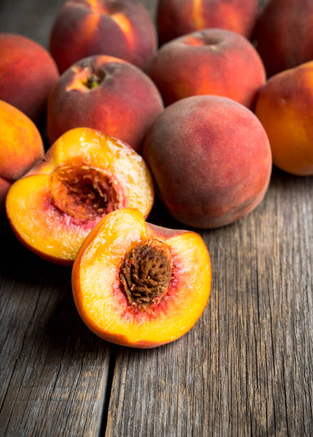 istock Sweet ripe peaches on the rustic background 1174751825
