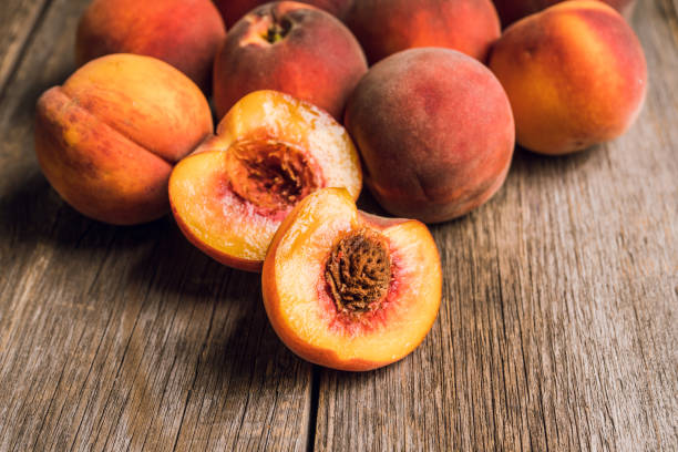 istock Sweet ripe peaches on the rustic background 1174751838