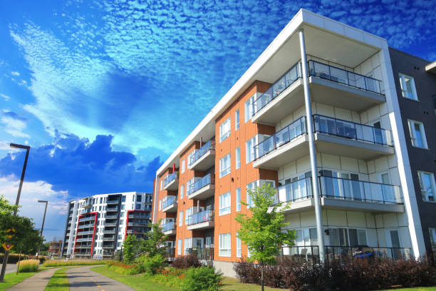 istock Large Multi-Condos Building Blocks with Bicycles Lane and Pedestrian Walkway 1174753599