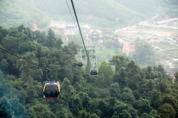 istock Cable car in the fog.Beautiful nature trail (da nang,vietnam) 1174757796