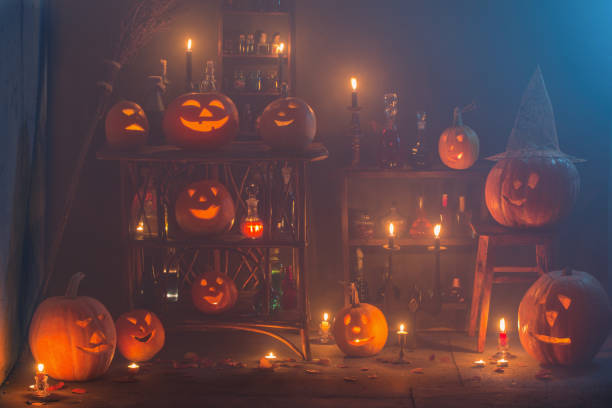 istock Halloween decoration with pumpkins and magic potions indoor 1174759785