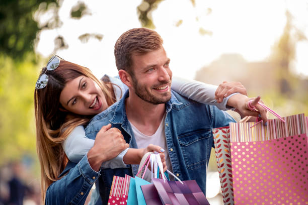 istock Couple with shopping bags 1174761480