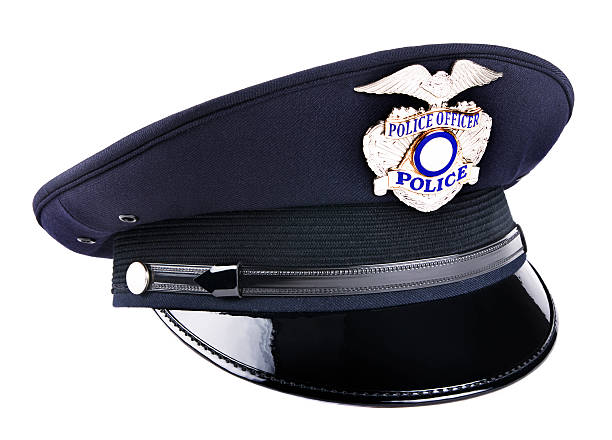 istock A black police cap with metal badge  117476787