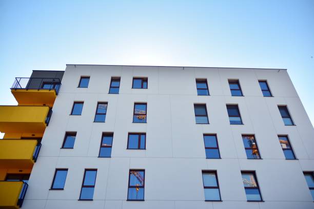 istock Modern apartment buildings on a sunny day with a blue sky. 1174768099