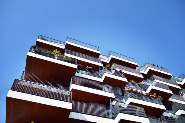 istock Modern apartment buildings on a sunny day with a blue sky. 1174768629