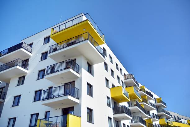 istock Modern apartment buildings on a sunny day with a blue sky. 1174769768