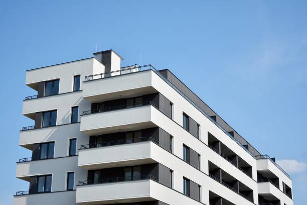 istock Modern apartment buildings on a sunny day with a blue sky. 1174771211