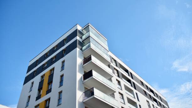 istock Multistory new modern apartment building. 1174771517