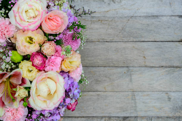 Flower bouquet on wood table. stock photo