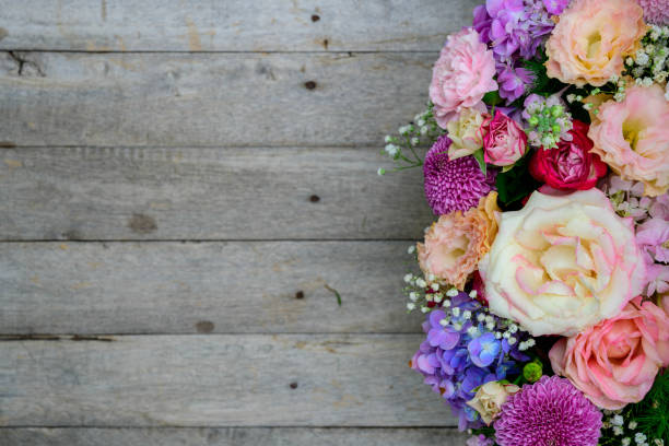 istock Flower bouquet on wood table. 1174774449