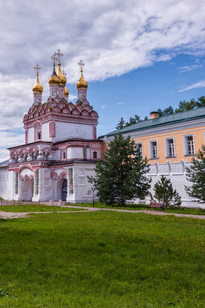 istock Entrance gate to the monastery, side view. Vertical orientation. 1174777311