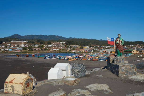 Curanipe, Chile - APRIL 20, 2015: Colourful fishing boats on the beach in the small fishing village of Curanipe in the Maule Region of Chile.